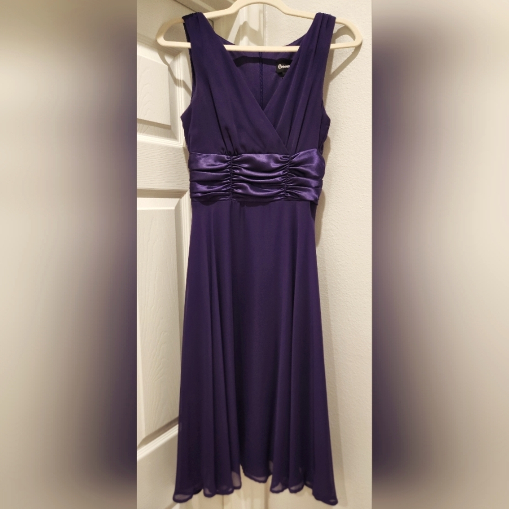 Purple surplice bodice party dress